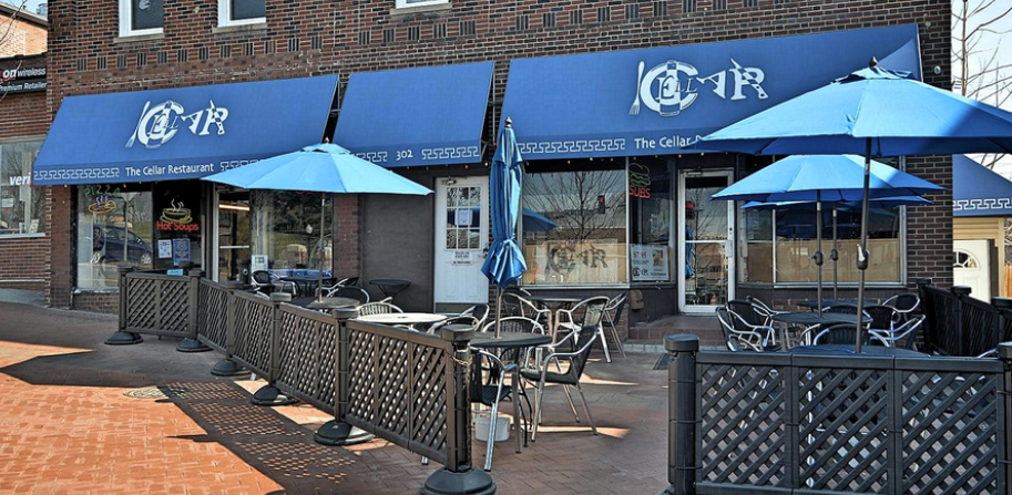 Patio seating in front of The Cellar